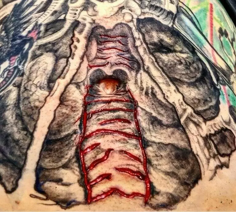 A anatomical tattoo of the inside of a human body, inspired by Ronnie Shaw.